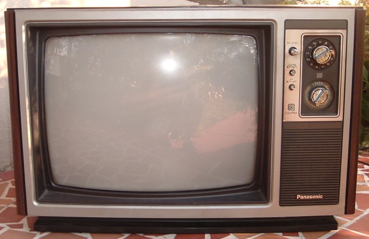 1980s Panasonic color television with wood paneling.
